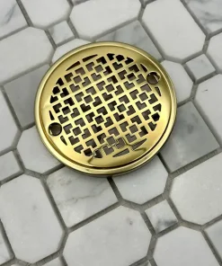 Round Drain in Polished Brass Finish.