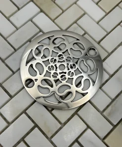 Round drain in Polished stainless steel finish.