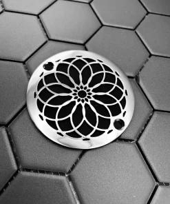 Round drain is polished stainless steel finish.