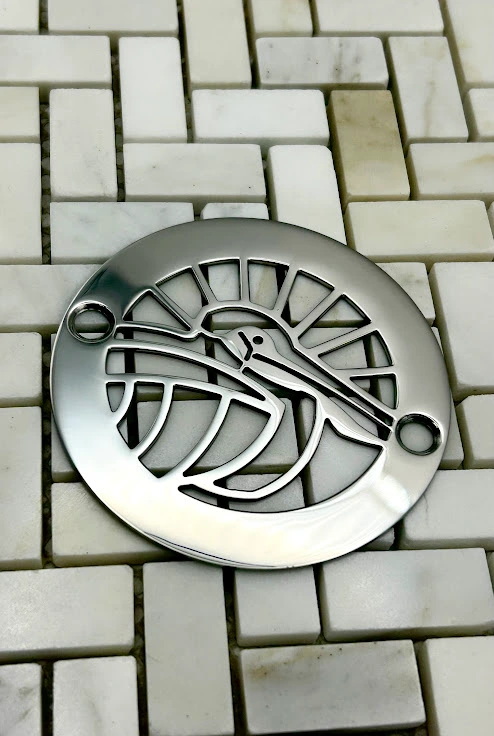 Round drain in Polished stainless steel finish.