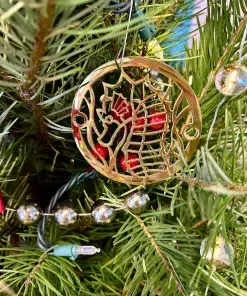 Seahorse round drain in polished brass finsh.