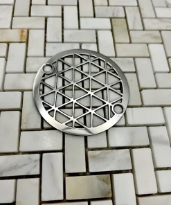 Round drain in Polished stainless steel finish.