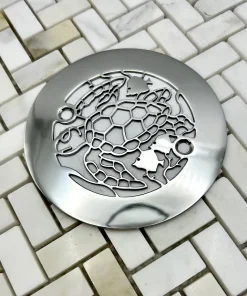 4.25 round turtle design in polished stainless steel finish.