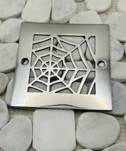 Square drain with polished stainless steel finish.