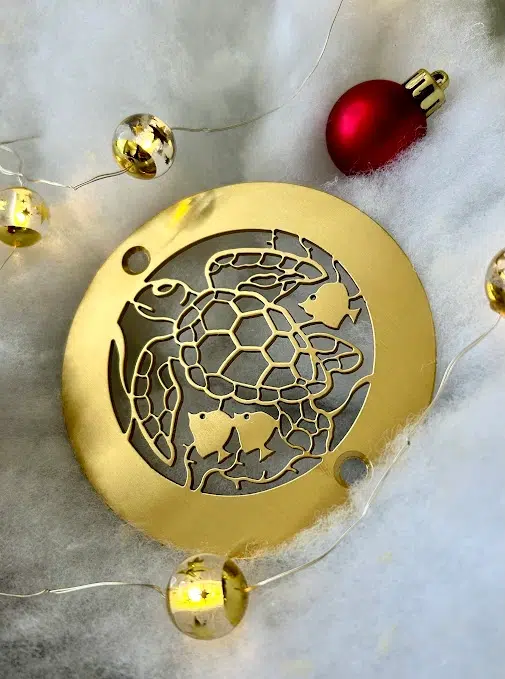 Round Drain in Brushed Brass Finish.