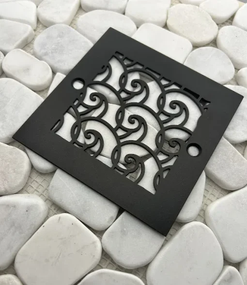 Square drain with oil rubbed bronze finish.
