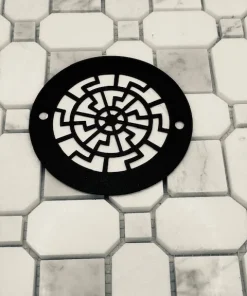 Geometric Pattern No. 3, 4 inch round with matte black finish on white tile