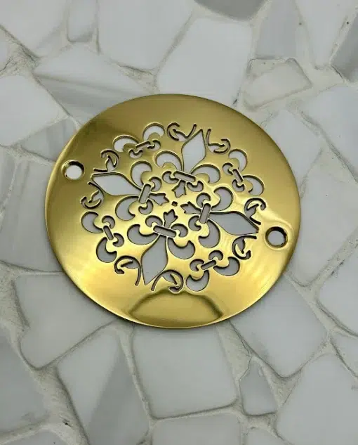 Round drain in a Polished Brass finish.