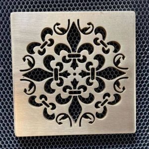 Mon Fleur shower drain cover brushed stainless steel by Designer Drains