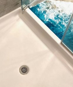 Nautilus-4.25-Round-Shower-Drain-installed-Polished-Stainless_Designer-Drains