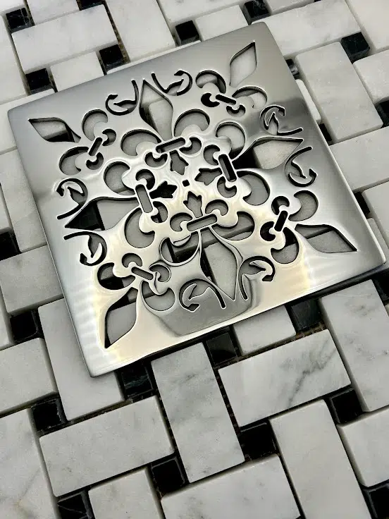 Square drain in Polished stainless steel finish.