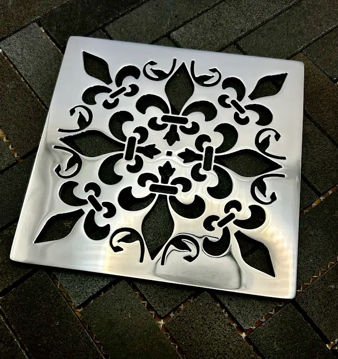 Square drain in Polished stainless steel finish.