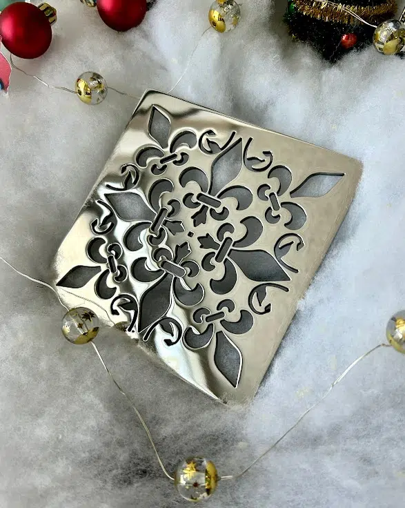 Square drain in Polished stainless steel finish.