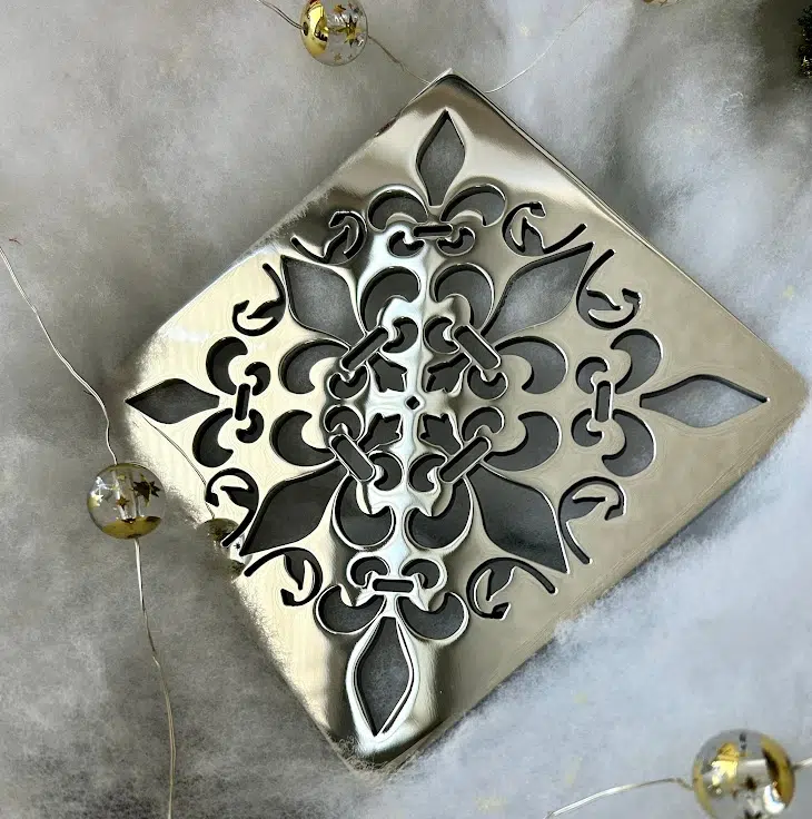 Square drain in Polished stainless steel finish.