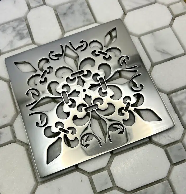Square drain in Polished stainless steel finish.