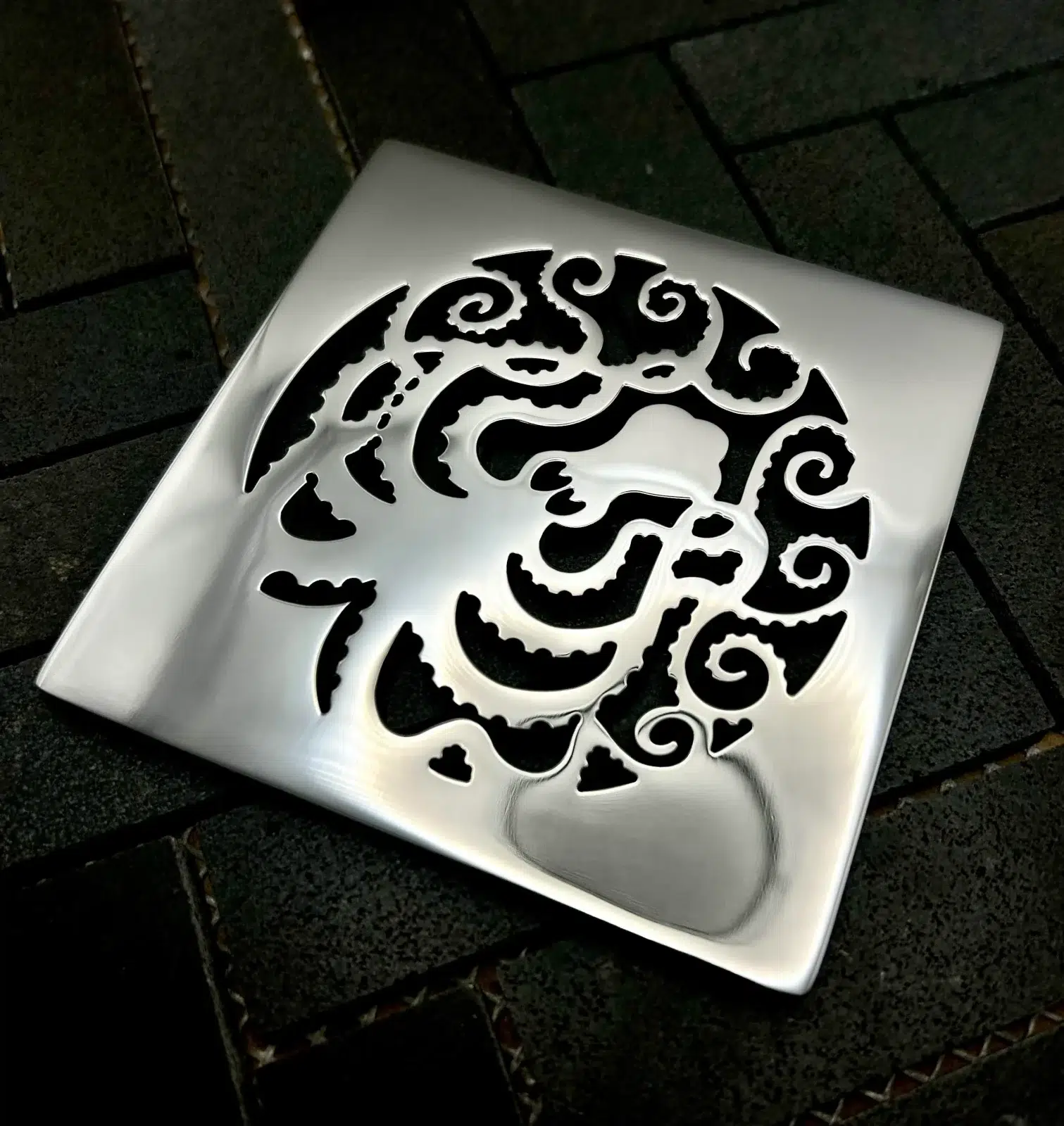 Square drain in Polished stainless steel finish.