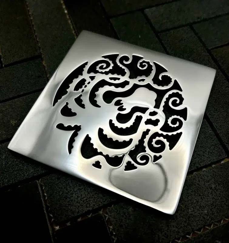 Square drain in Polished stainless steel finish.