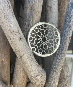 Round Drain in a polished stainless steel finish.