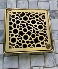 Bubbles Schluter brushed brass in brass rough