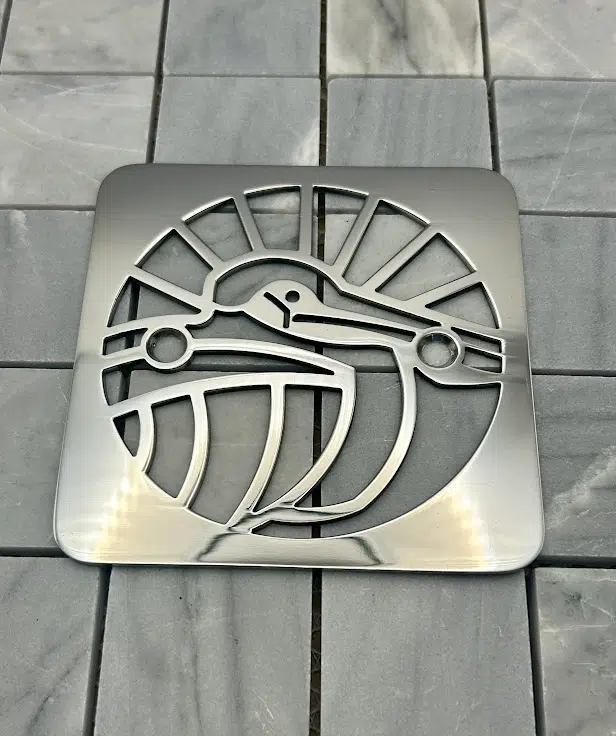 Square drain in Polished stainless steel finish.