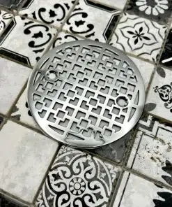 Kohler round with geometric squares no.1 design in polished stainless steel finish.