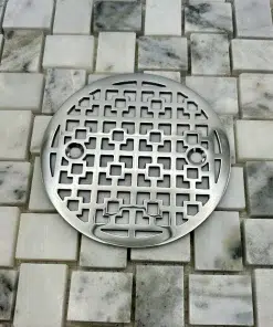 Kohler round with geometric squares no.1 design in polished stainless steel finish.