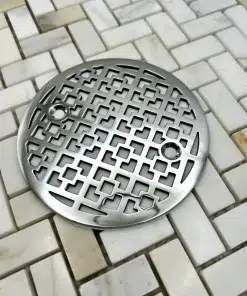 Kohler round with geometric squares no.1 design in polished stainless steel finish.