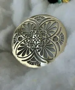 Round Drain in Polished Nickel Finish.