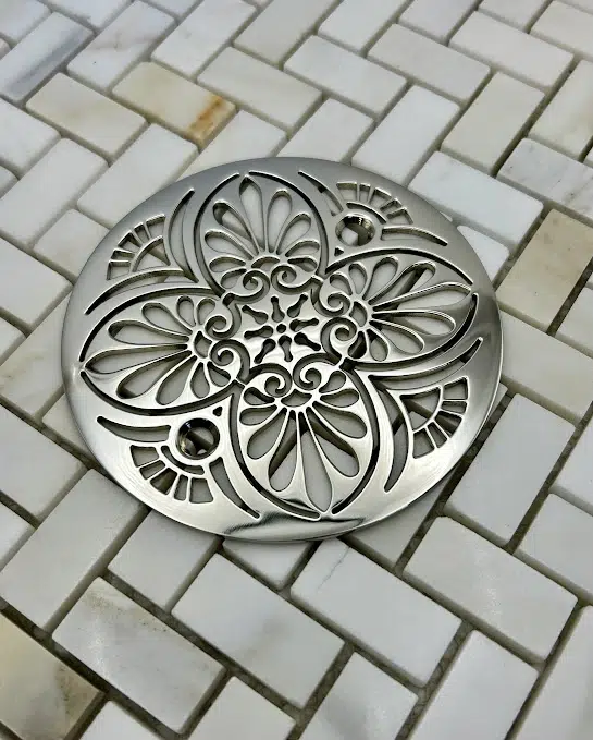 Round Drain in Polished Nickel Finish.