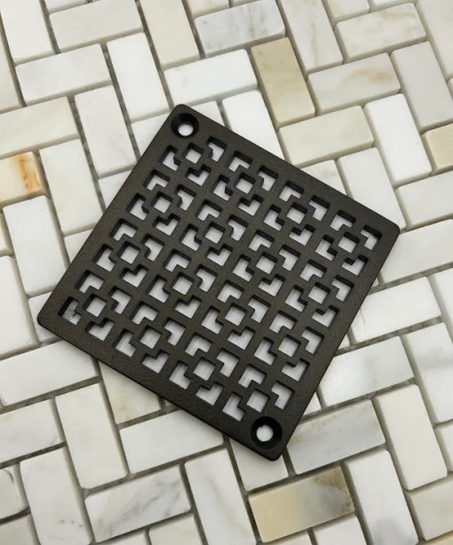 Square drain with oil rubbed bronze finish.