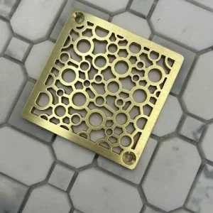 Square drain with unlaquered brushed brass finish.