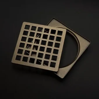 Designer Drains 4-inch Schluter-Kerdi Trendline-style drain cover with no fastening holes. Geometric No. 7 Oil Rubbed Bronze Trendline Kit