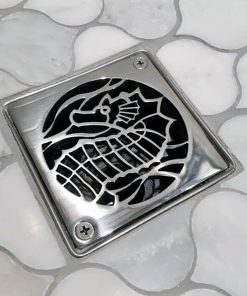 square shower drain with seahorse design
