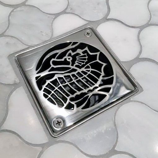 square shower drain with seahorse design