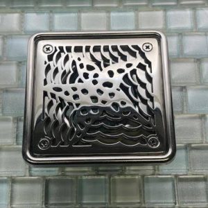 Starfish Laticrete in drain rough-in polished stainless steel on blue tile