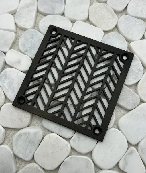 Square drain with oil rubbed bronze finish.