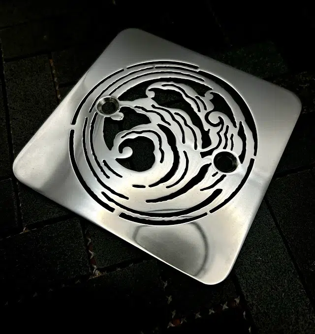 Square drain in Polished stainless steel finish.