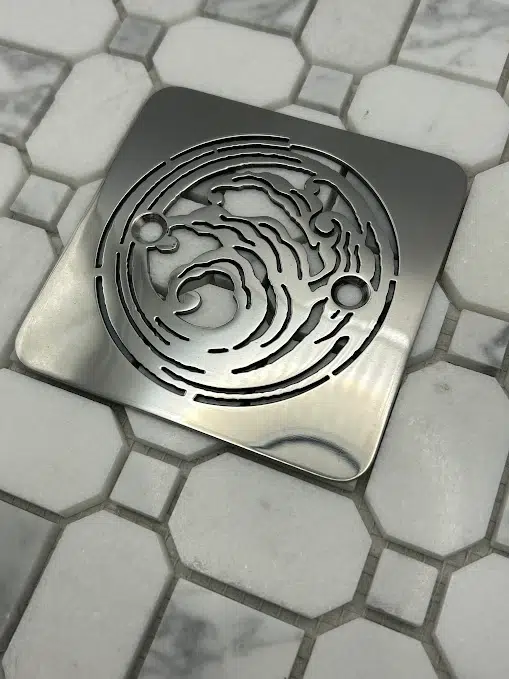 Square drain in Polished stainless steel finish.