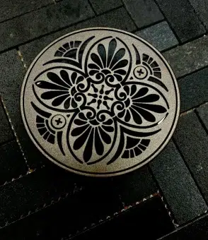 Round drain in oil rubbed bronze finish.