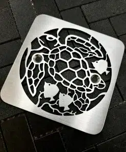 Turtle design in brushed stainless steel finish on black tile. Replacment for Kohler.