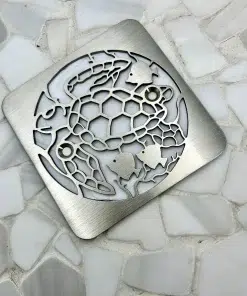 Turtle design in brushed stainless steel finish on white tile. Replacment for Kohler.