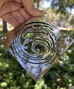 Square drain with polished stainless steel finish.