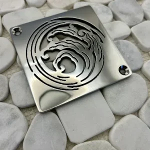 Square drain with polished stainless steel finish.