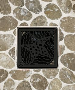starfish square shower drain on rock tile floor