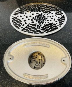 Starfish-Oval-Drain-Kit-installed-on-black-granite_Designer-Drains