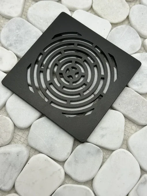 Square drain with oil rubbed bronze finish.