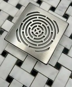 Square drain in maze design with brushed stainless steel finish. Replacement for Schluter Trendline.