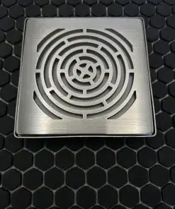 Square drain in maze design with brushed stainless steel finish. Replacement for Schluter Trendline.