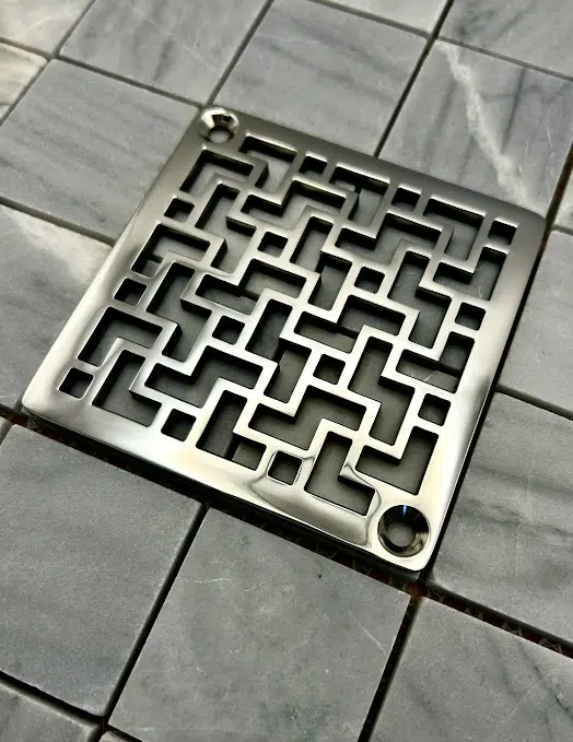 Tulun Schluter Square Drain in Polished Stainless Steel Finish.