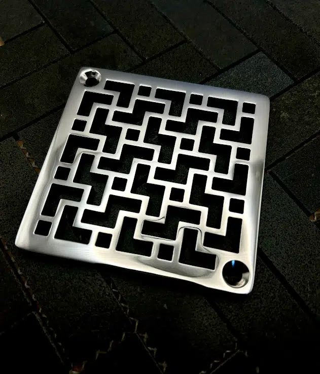 Tulun Schluter Square Drain in Polished Stainless Steel Finish.